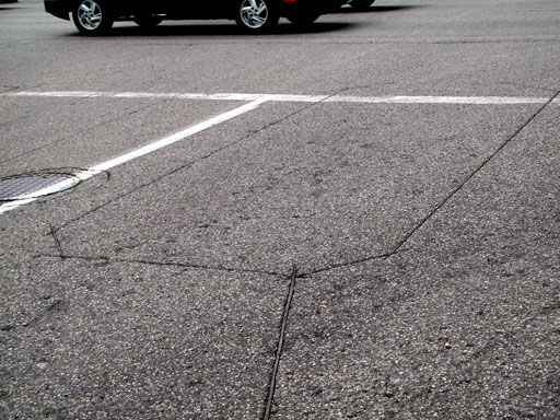 Car-sized ILD outline ine asphalt